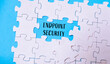 © Алла Морозова - A jigsaw puzzle with a piece missing and the word Endpoint Security written in the gap. The puzzle is on a blue background