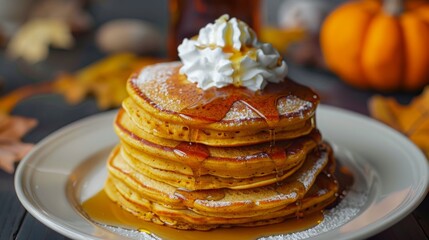a delicious stack of fluffy pumpkin pancakes topped with maple syrup and whipped cream, set against 