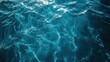 © indyntk - Transparent blue clear water surface texture soft ripples sunlight reflections natural fluidity calming aesthetic ocean vibes minimalistic design depth visual high-quality wallpaper art serene