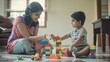 © VK Studio - A mother and her young son play with multicolored building blocks on the floor of their home, the room filled with natural light, depicting learning and creativity.