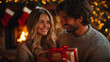 © Andy - Happy Couple Exchanging Christmas Gift by the Fireplace in Cozy Holiday Setting
