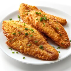 Wall Mural - Two golden fried fish fillets with parsley and dill garnish, served on a white plate.