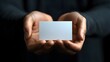 © JCreative - Close up Hands Holding Minimalist Business Card for Professional Networking