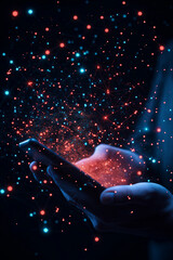 Wall Mural - a hand holding a cell phone in a galaxy of stars