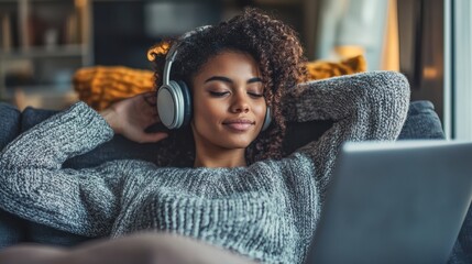 Poster - Woman enjoying music while working on laptop relaxed