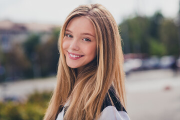 Poster - Photo portrait of pretty teen girl charming toothy beaming smile dressed stylish uniform outfit walk outside green park background