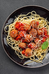 Wall Mural - spaghetti meatballs in tomato sauce meat fresh meal food snack on the table copy space foodbackground rustic top view