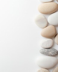 Poster - Delicate stones with a smooth finish, carefully arranged in a serene composition, crisp backdrop with ample room for text.