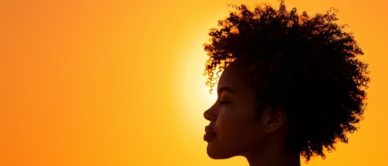 Wall Mural -  A tight shot of a face with the sun behind and hair in front