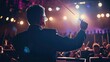 © Elbowpain - Image of a male orchestra conductor direct