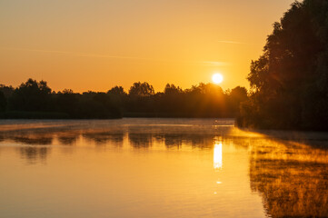 Canvas Print - Caldecotte lake at sunrise in Milton Keynes. England