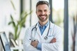 © Skyfe - Smiling Middle-Aged Caucasian Doctor in White Coat with Stethoscope in Modern Clinic - Healthcare Professional Concept