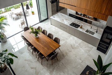 Wall Mural - The spacious kitchen features a marble granite countertop with a large wooden dining table complemented by stylish chairs, surrounded by greenery