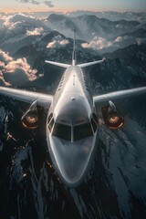 Aufkleber - A large airplane flies over a mountain range with snow-capped peaks and valleys