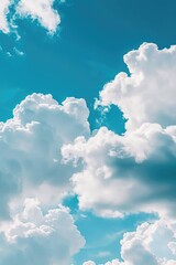 Aufkleber - A plane flying high above the clouds in a bright blue sky