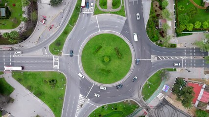 this stunning aerial drone photo shows a bustling roundabout in sevilla, spain, framed by vibrant gr