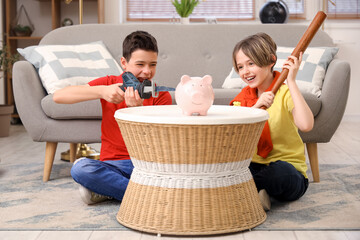 Poster - Happy brothers breaking piggy bank at home