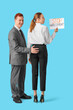 © Pixel-Shot - Business woman holding paper with text STOP HARASSMENT and male colleague touching her butt on blue background