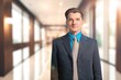 © BillionPhotos.com - Happy professional businessman posing in office