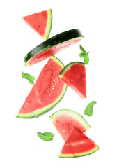 Poster - Flying pieces of fresh watermelon and mint on white background