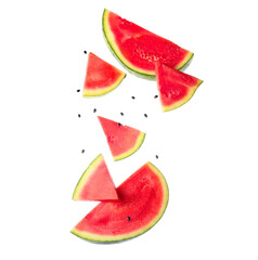 Poster - Flying pieces of fresh watermelon and seeds on white background