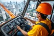 © Michael - A crane operator working on a high-rise construction site.