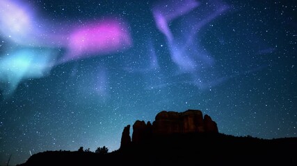 Wall Mural - sedona solar storm purple and milky way galaxy time lapse over cathedral rocks arizona usa