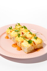 Wall Mural - Baked Sesame and Cheese Roll with Sweet Chili Sauce on Pink Plate