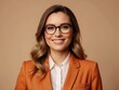 © Basileus - Portrait of a Smiling Woman Wearing Glasses and an Orange Blazer