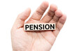 © Wongsakorn - Text PENSION wooden block on hand with Clipping path isolate on white background. Financial and business concept. retirement saving concept.