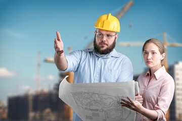 Wall Mural - Two engineer working at construction site building project,