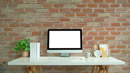 Wall Mural - Front view of stylish workspace with blank screen desktop computer.