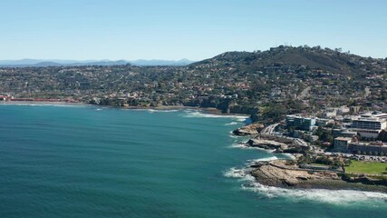 Wall Mural - Pivoting in the Sky with a View of Rocky La Jolla Coast