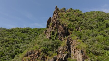 Wall Mural - Rocky Mountain And Lush Vegetation  - Drone Shot