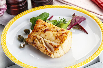 Canvas Print - Roasted cod fish steak with salad