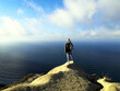 © OmAnSe - Tourist on edge of cliff above sea