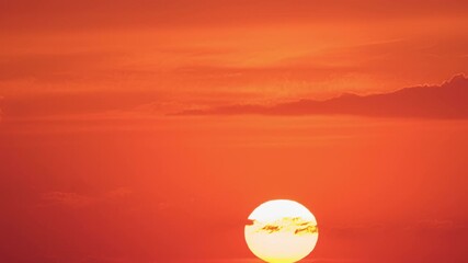 Wall Mural - Nature’s twilight painted the skyline with shades of red and orange, time lapse