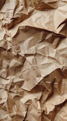 Poster - Crumpled brown paper displays a complex pattern of folds and textures, illuminated softly to highlight its natural characteristics