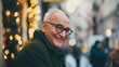 © VK Studio - An elderly man in glasses, smiling warmly while standing outdoors against a backdrop of blurred city lights.