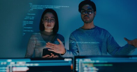 Group adult Asia male female software developers mentor leader manager talk strategy plan to executive write prompt AI bot IT app program nomad, video game, data center. Projecting slideshow code.