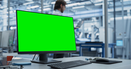 Leinwandbilder - Modern Industrial Manufacture with Desktop Computer with Green Screen Mock Up Display. Scientific Lab, Engineering Research Center with High-Tech Equipment, Technology for Robot Development
