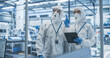 © Gorodenkoff - Industrial Scientists Wearing Disposable Protective Suits, Masks and Goggles at a Production Plant. Specialist Using Tablet Computer, Analyzing Potential Work Hazards and Contamination at a Workplace