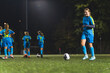 © PoppyPix - soccer player young girl in light blue uniform playing with a ball at the stadium, full shot. High quality photo