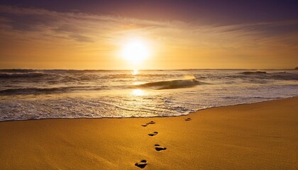 Wall Mural - golden sunset over a tranquil beach with footprints leading towards the sea