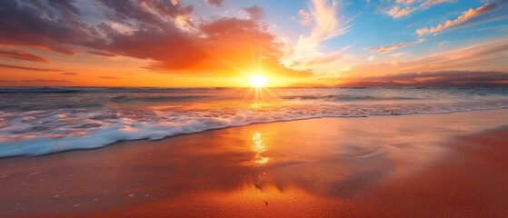 Canvas Print -  The sun sets over the ocean, waves approaching shore, foreground features a beach