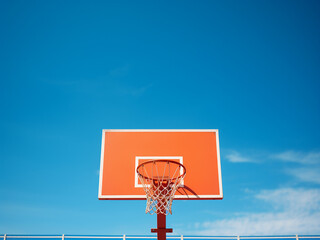 Wall Mural - Basketball board with a clear blue sky