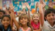 © liliyabatyrova - A group of enthusiastic school kids raise their hands during a lively lesson, showcasing their eagerness to participate