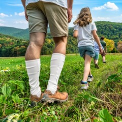 Family adventure through lush green hills on a sunny day in autumn