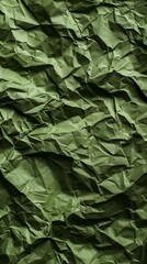 Poster - Crumpled olive green paper displays intricate textures and shadows under soft light, creating a visually engaging composition