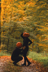 Poster - pregnant woman having with man having fun in halloween cost